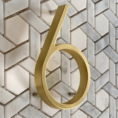 gold door number signs